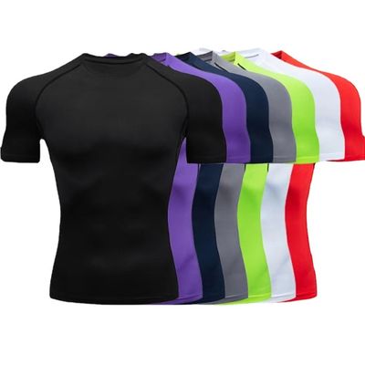 XMAMLON T-shirt étroit à manches courtes pour hommes parfait pour l'entraînement de compression athlétique