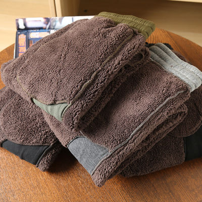 100% de coton brodé en laine d'homme en doublure de laine des coureurs des pantalons chauds rembourrés des pantalons pour la taille moyenne