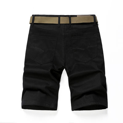 Shorts d'entraînement pour hommes en tissu de polyester avec un design de couleur simple et solide