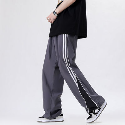 Pantalon de course polyester/coton avec ceinture élastique par XMAMLON Designer