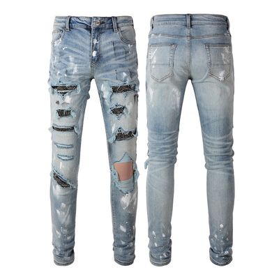 Jeans à l' écorce en denim de la mode, cristaux, rivets, coupe de chaussure, jeans avec matériaux lavables