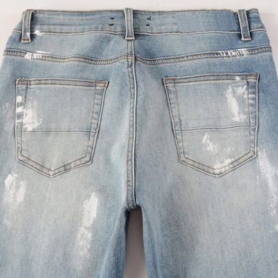 Jeans à l' écorce en denim de la mode, cristaux, rivets, coupe de chaussure, jeans avec matériaux lavables